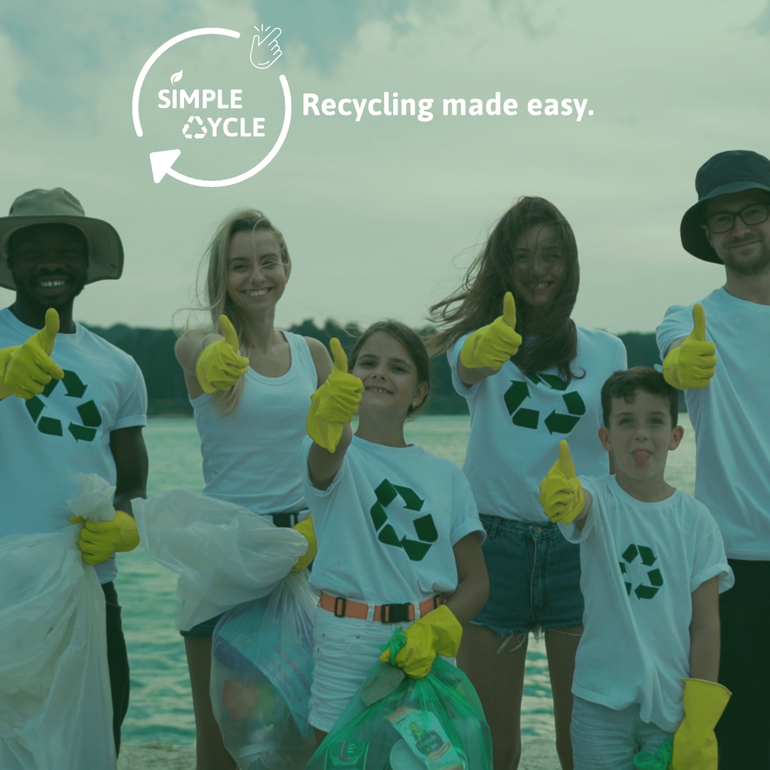 Family and friends wearing white recycling shirts with a green recycling logo in the middle. All smiling holding up a thumbs up with yellow gloves after recycling plastic waste from a beach.