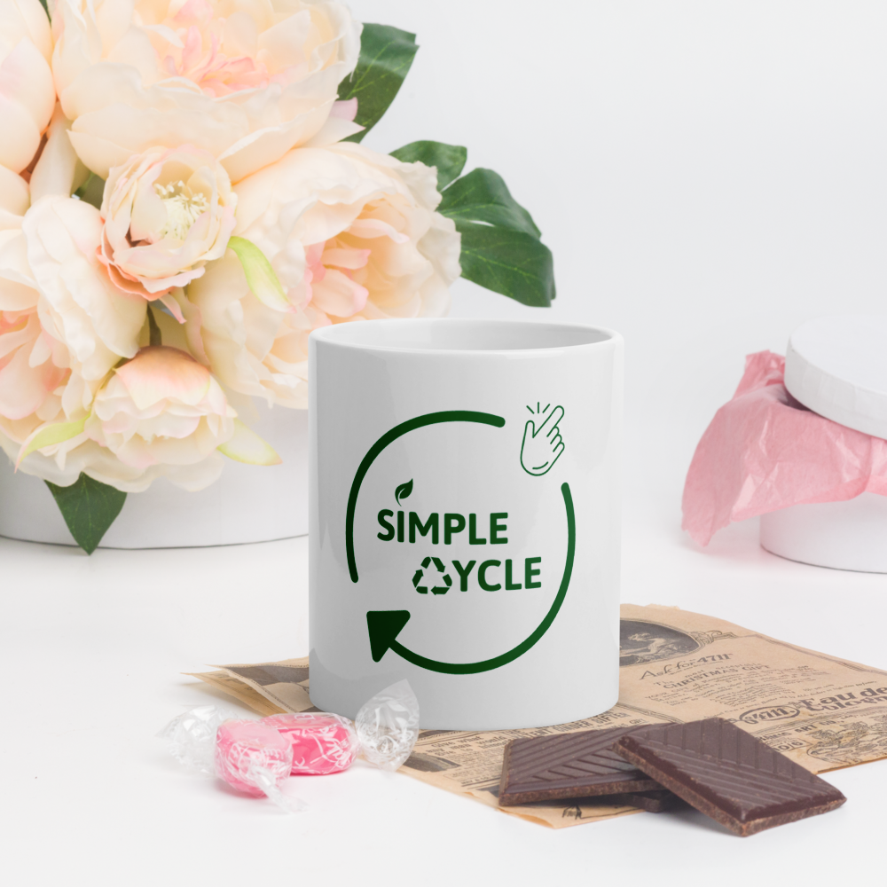 SimpleCycle White Glossy Mug front view with candy