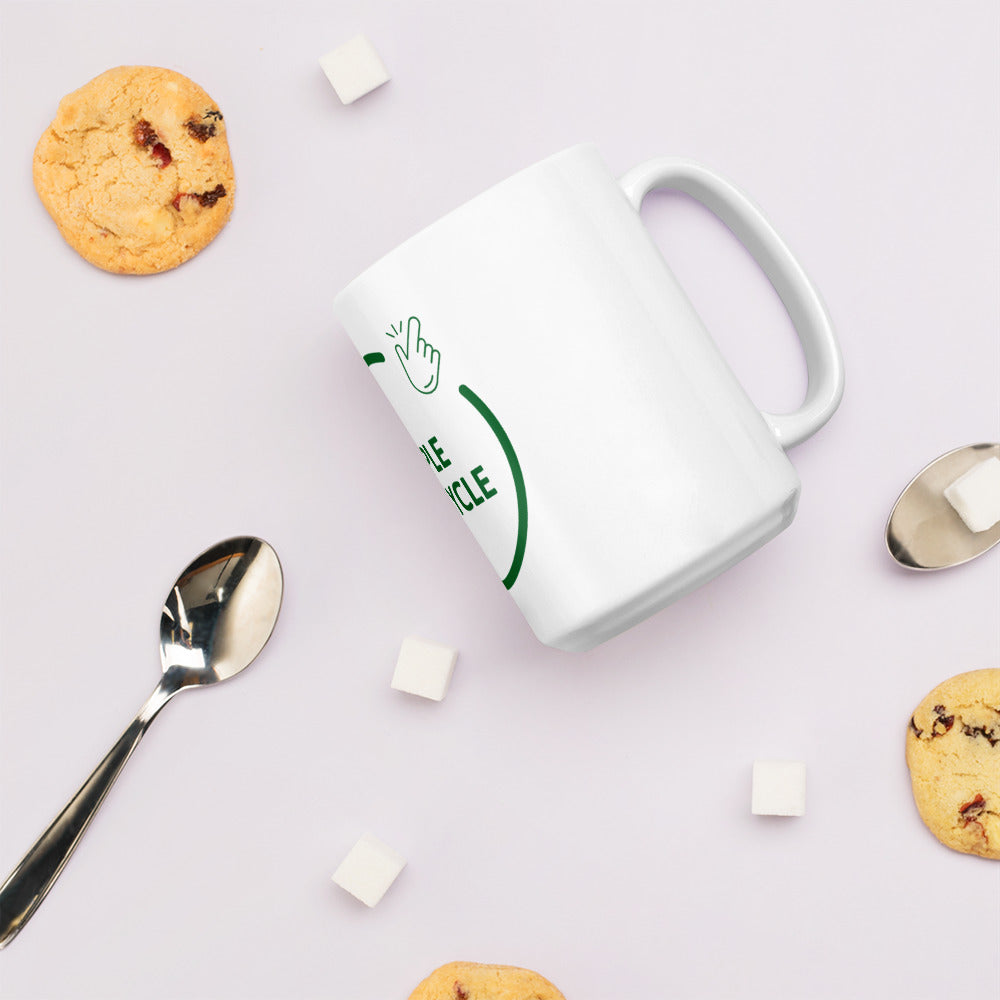 SimpleCycle White Glossy Mug side view next to a cookie and spoon