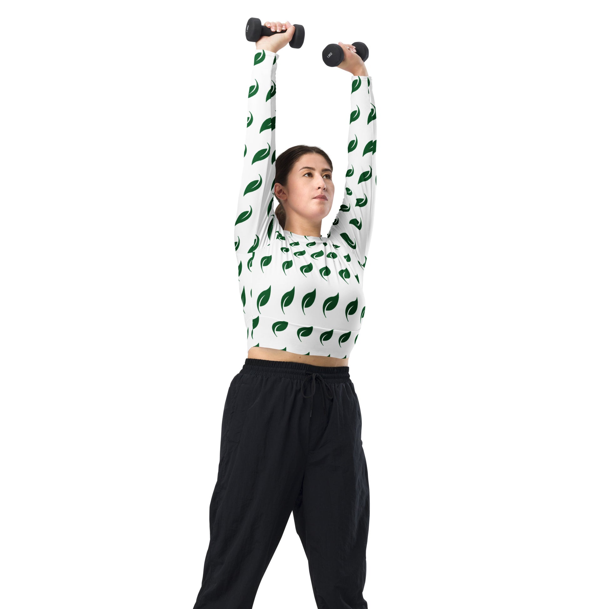 Model wearing the Eco Leaf Recycled Long-Sleeve Crop Top while lifting weights over her head.