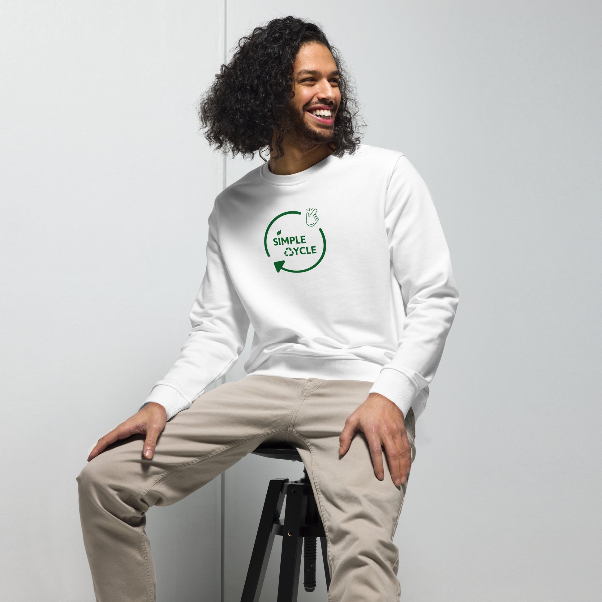 SimpleCycle Branded Unisex Organic Sweatshirt White model sitting on a chair