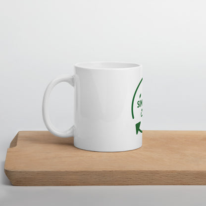 SimpleCycle White Glossy Mug on a cutting board